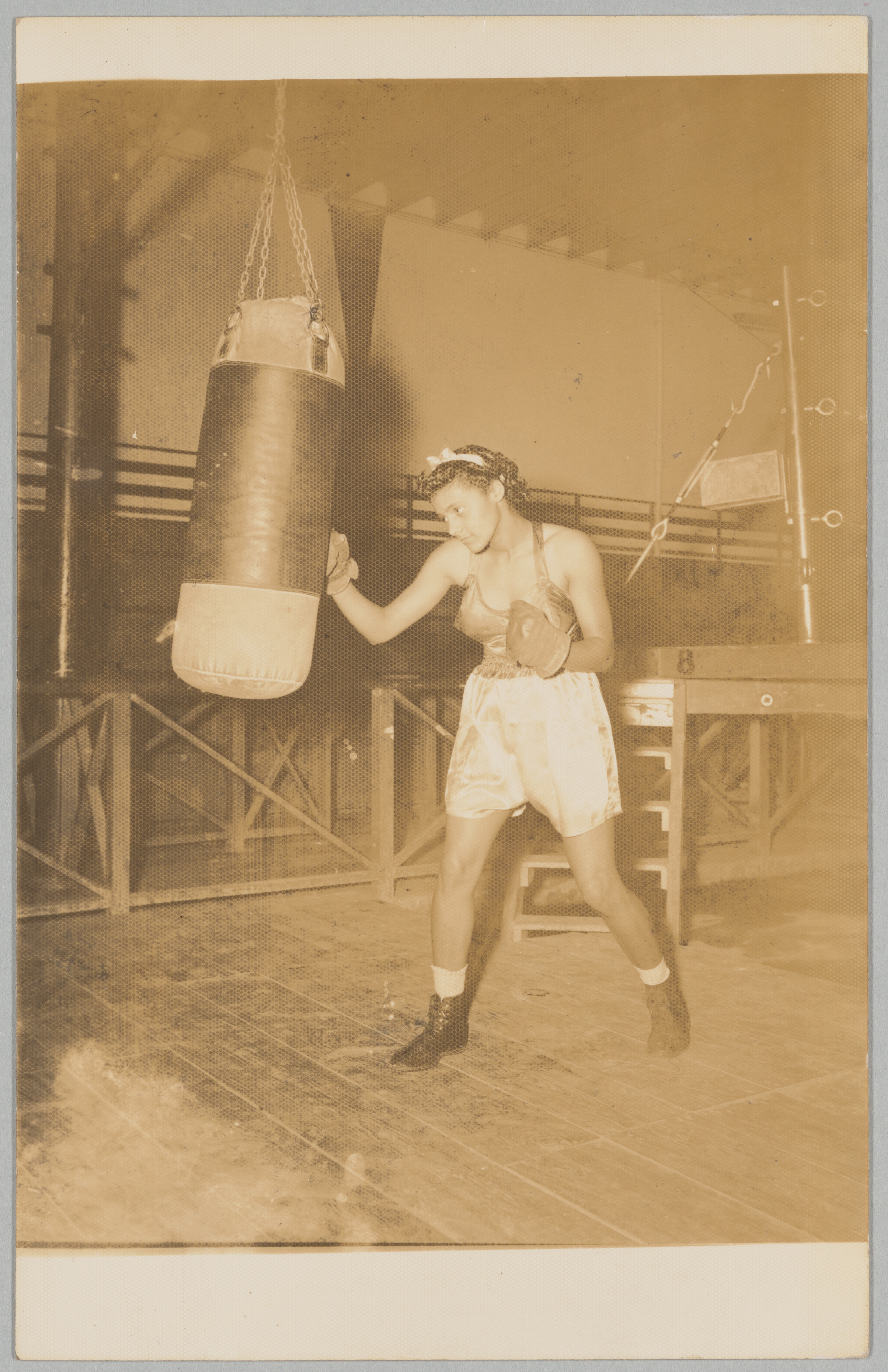 Photographic postcard of boxer Emma Maitland